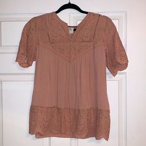 Cute light pink blouse. Perfect for spring!